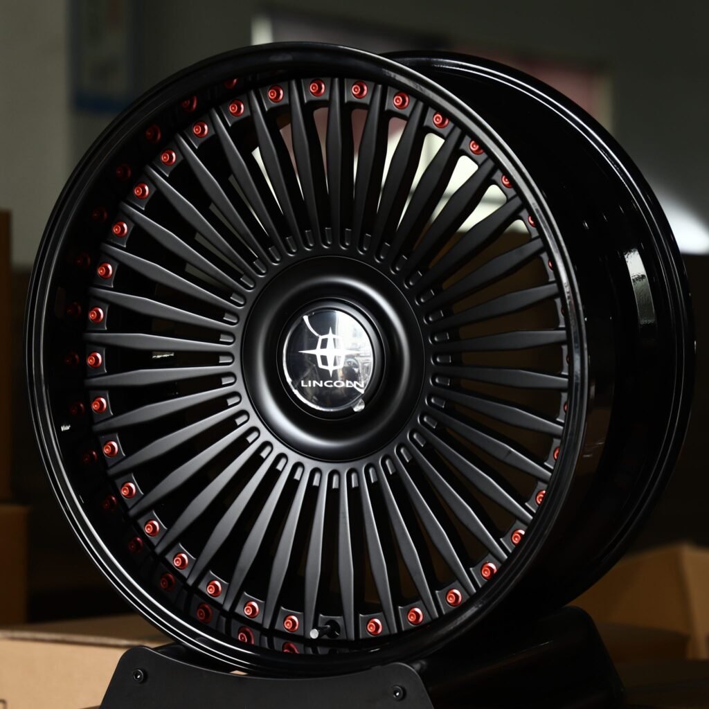 Lincoln MKZ wheels – Satin Black Multi-Spoke 2-Piece Red-Rivet Floating Cap (Lincoln OEM-Style), angled view