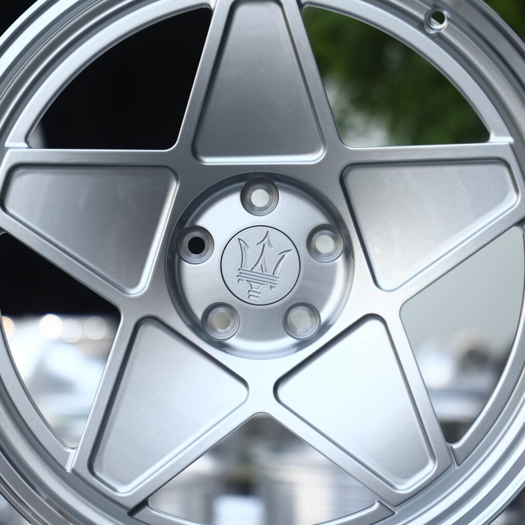 5x114.3 wheels – Bright Silver 5-Star Spoke Stepped Lip (Maserati OEM-Style), side view