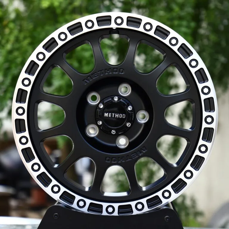 Method-Style Matte Black Machined Bolt Ring 12-Spoke Off-Road Forged Wheels – Jeep Wrangler / Land Rover Defender, front view