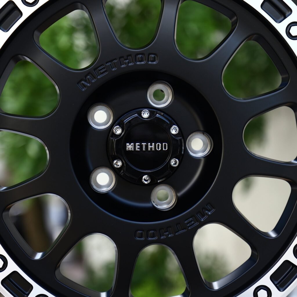 Jeep Gladiator wheels – Matte Black Machined Bolt Ring 12-Spoke (Method-Style), lip and barrel detail