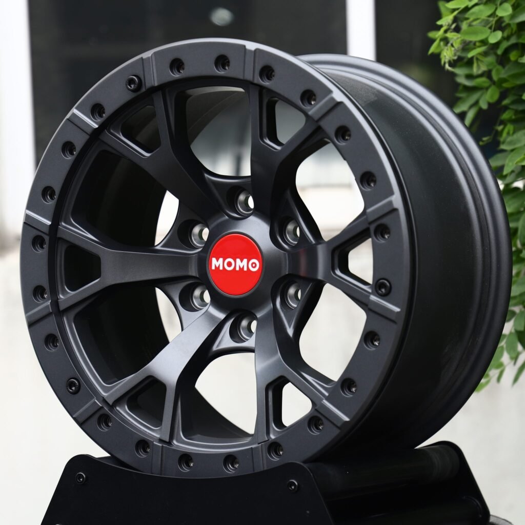 Toyota Tacoma wheels – Matte Black 5 Split-Spoke Beadlock (Momo-Style), angled view