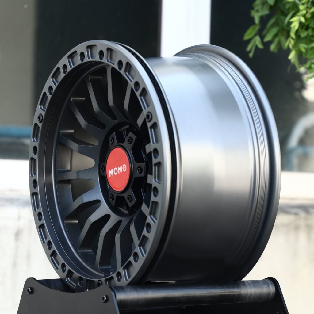 6x139.7 wheels – Matte Gunmetal 10-Spoke Beadlock (Momo-Style), side view