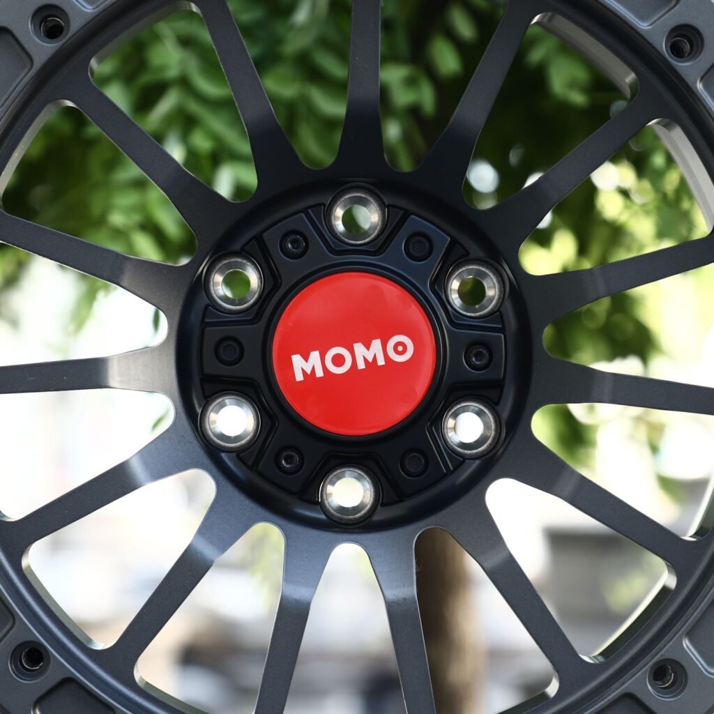Toyota Tacoma wheels – Matte Gunmetal 10-Spoke Beadlock (Momo-Style), lip and barrel detail