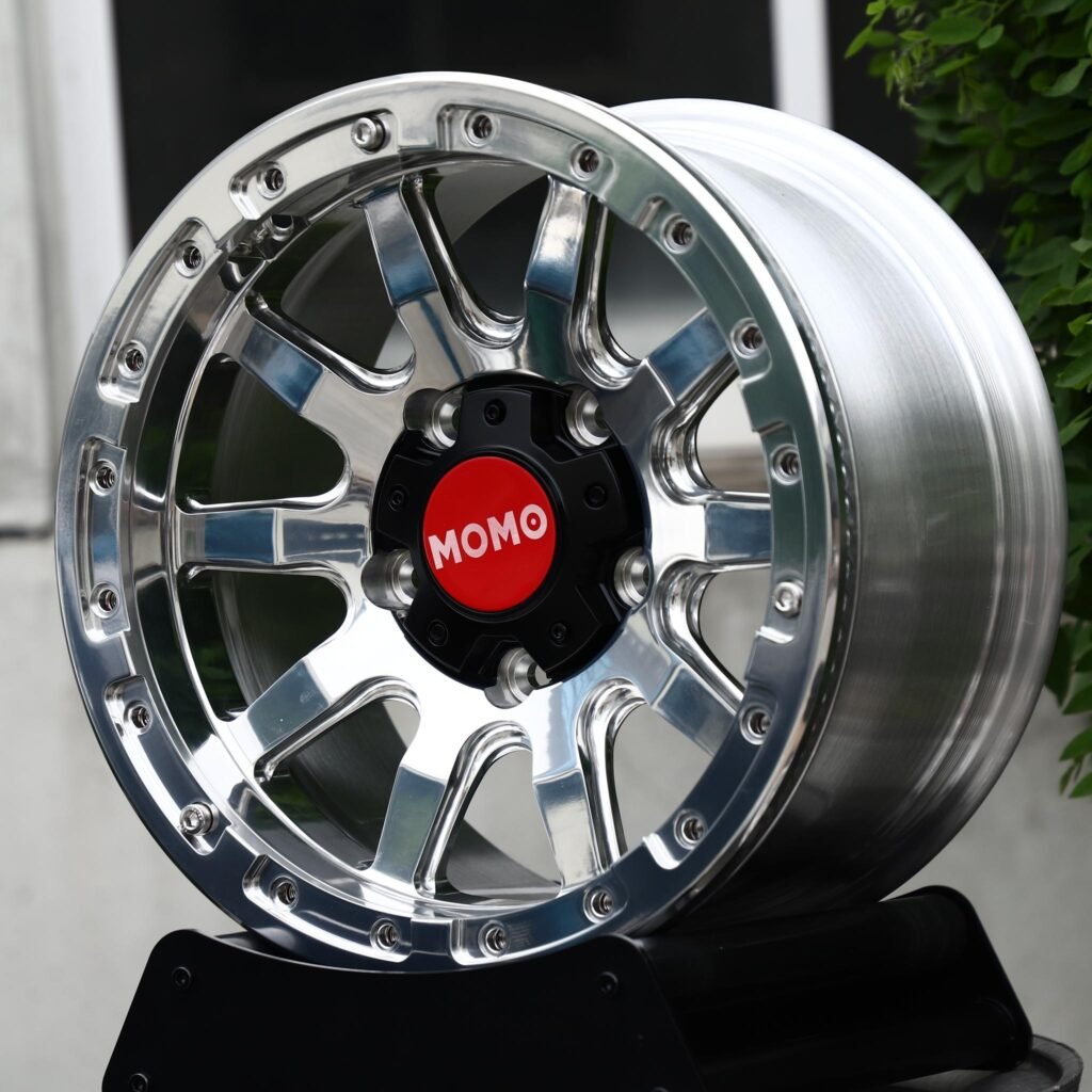 Toyota Tacoma wheels – Mirror Polished 10-Spoke Beadlock (Momo-Style), angled view