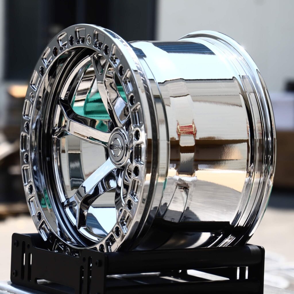 5x114.3 wheels – Chrome 5 Split-Spoke Silver Ring Beadlock (Nissan OEM-Style), side view