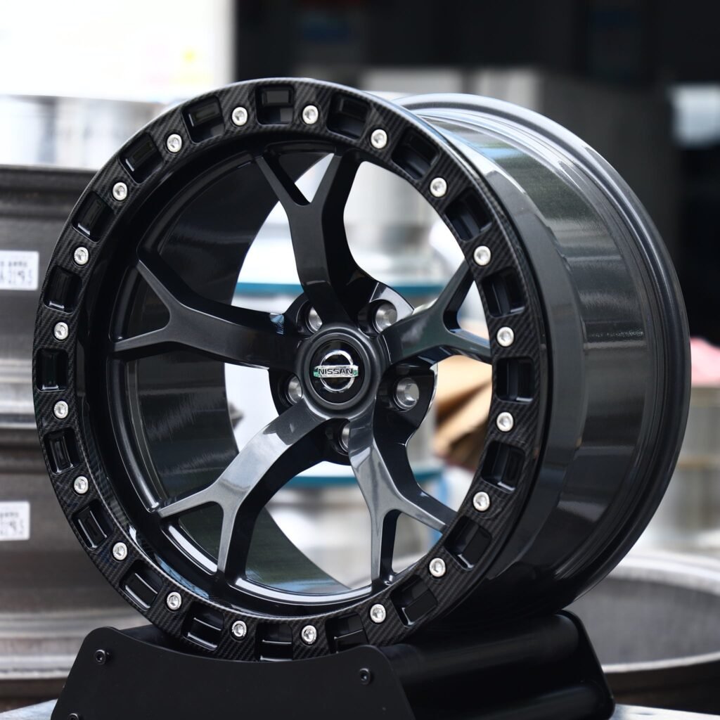 Nissan 370Z wheels – Gloss Black 5 Split-Spoke Beadlock (Nissan OEM-Style), angled view