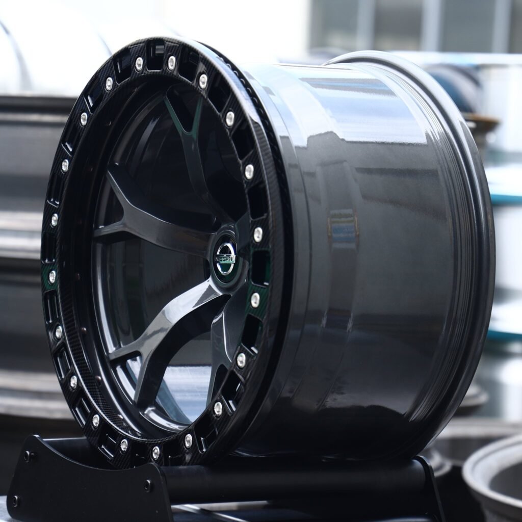 5x114.3 wheels – Gloss Black 5 Split-Spoke Beadlock (Nissan OEM-Style), side view