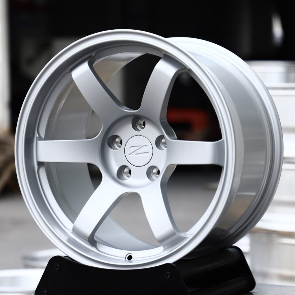 Nissan 350Z wheels – Matte Silver 6-Spoke (Nissan OEM-Style), angled view