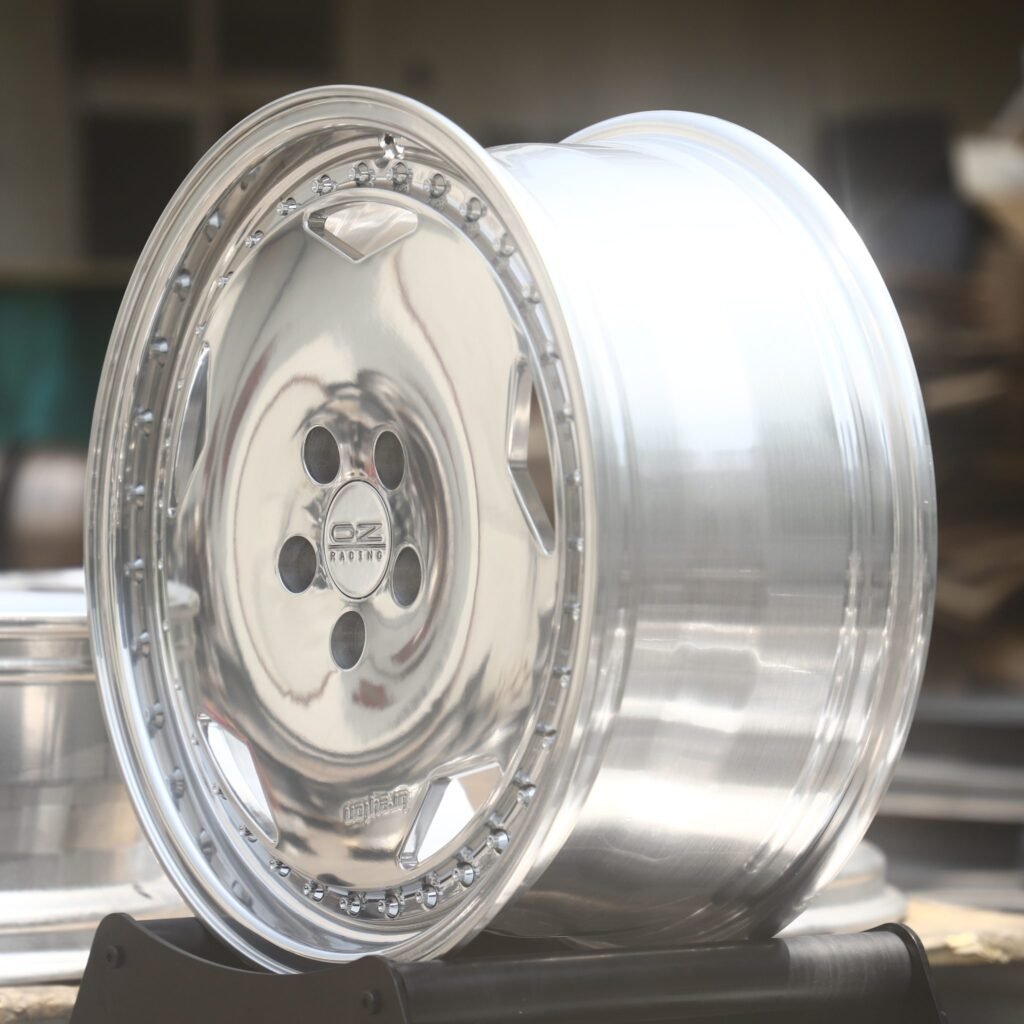 Hyundai Genesis wheels – Polished Turbofan Dish Riveted Lip (OZ Racing-Style), angled view