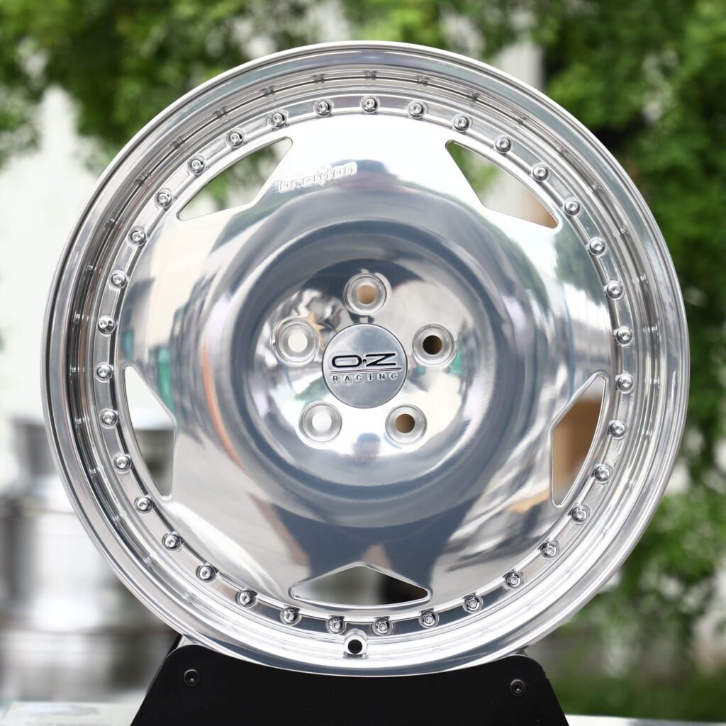 Tesla Model Y wheels – Polished Turbofan Dish Riveted Lip (OZ Racing-Style), rear view