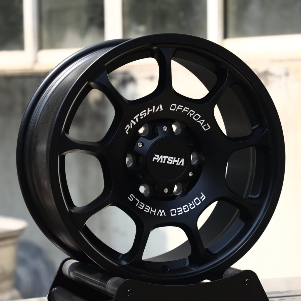 Toyota Tacoma wheels – Matte Black 10-Spoke (Patsha-Style), angled view