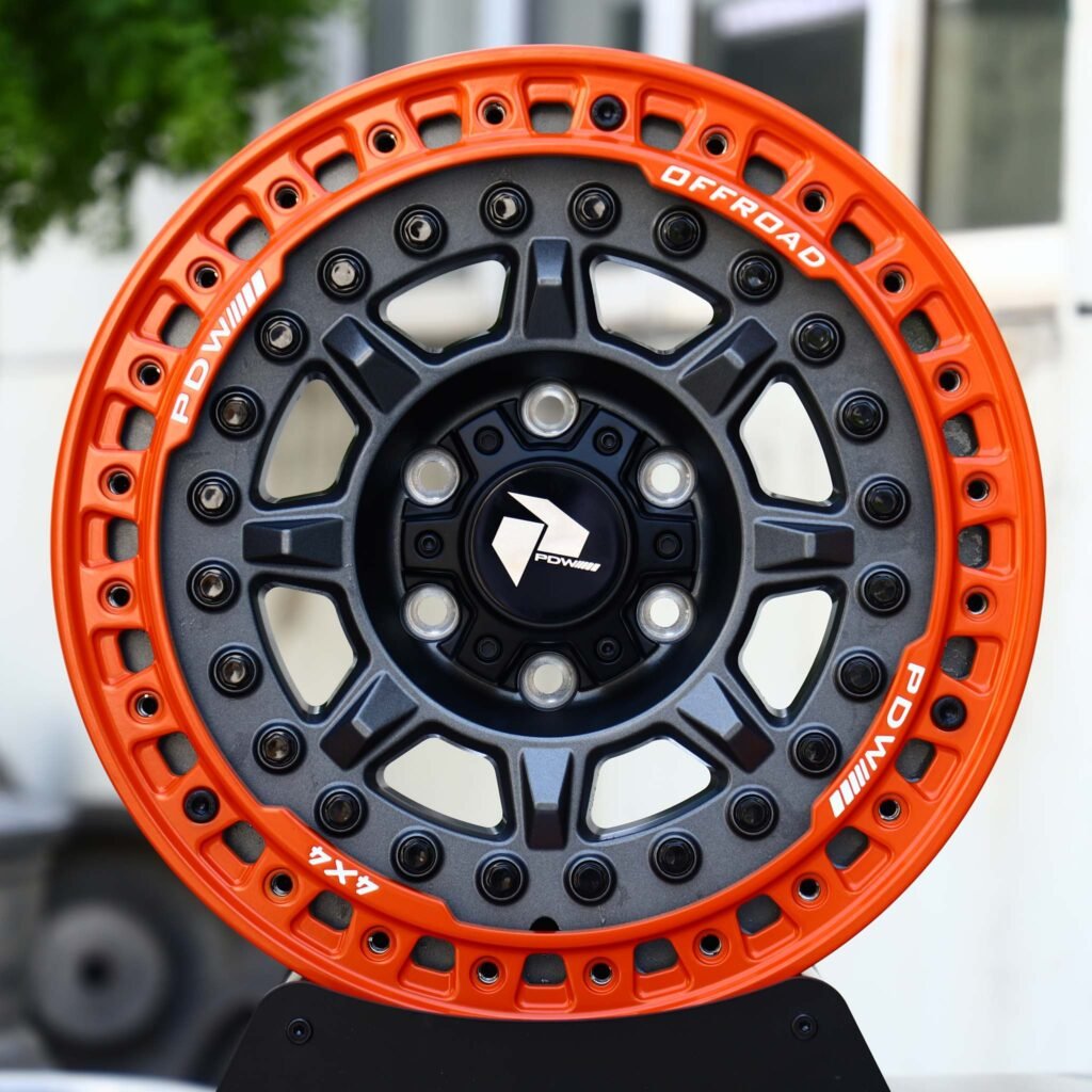 Ford Bronco wheels – Matte Black 8-Spoke Orange-Ring Beadlock (PDW Offroad-Style), front view