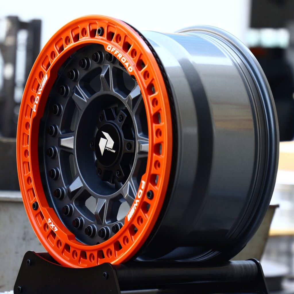 6x139.7 wheels – Matte Black 8-Spoke Orange-Ring Beadlock (PDW Offroad-Style), side view