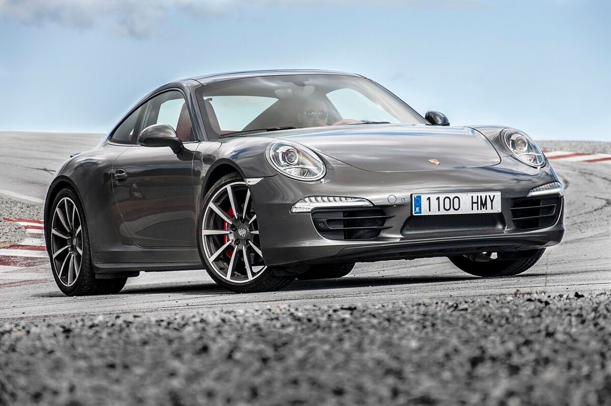 Grey Porsche 911 991 Carrera 4S on a track with multi-spoke wheels, 5x130 bolt pattern
