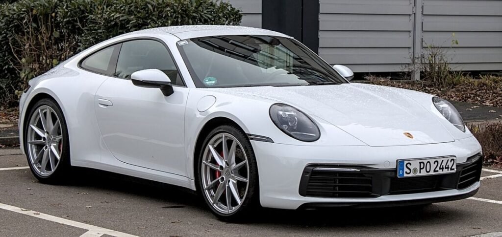 Porsche 911 bolt pattern shown on a white 992 Carrera S coupe with 5x130 wheels