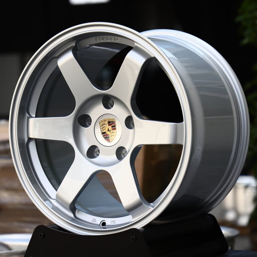 Porsche Macan wheels – Bright Silver 6-Spoke (Porsche OEM-Style), angled view