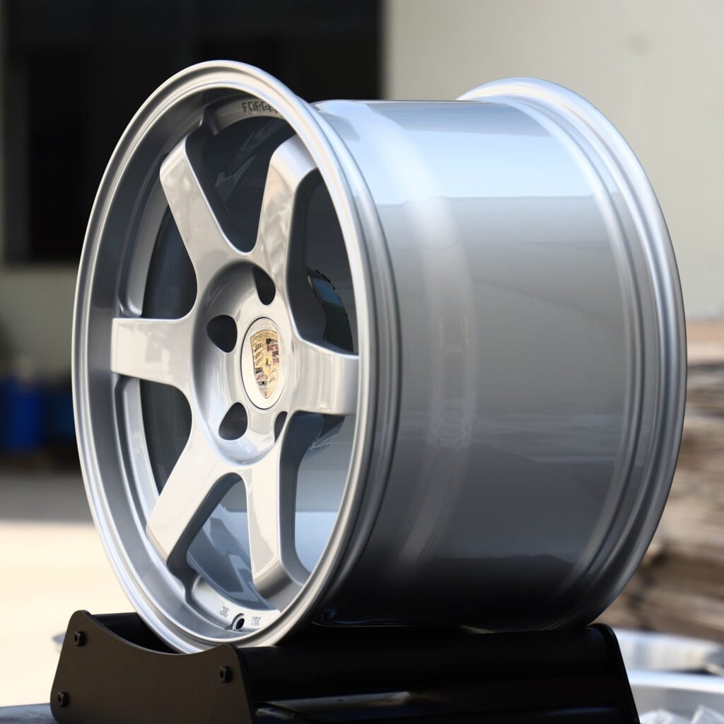 5x130 wheels – Bright Silver 6-Spoke (Porsche OEM-Style), side view