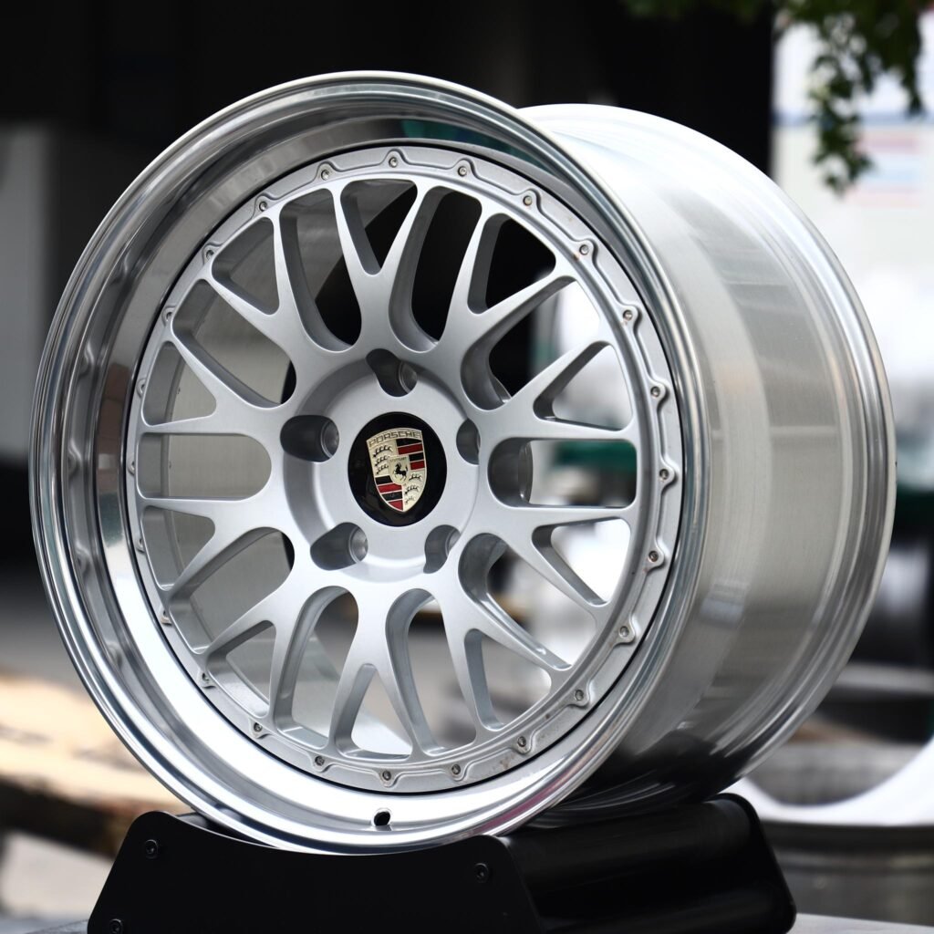 Porsche 718 wheels – Silver Cross-Spoke Mesh 2-Piece Polished Lip (Porsche OEM-Style), angled view