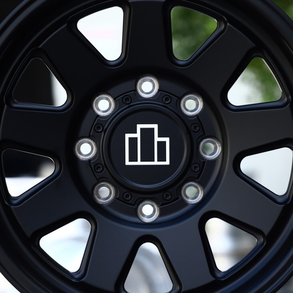 8x165.1 wheels – Satin Black 9-Spoke, side view