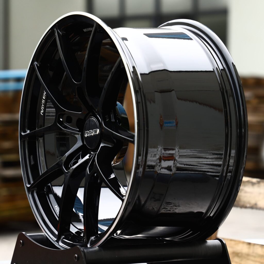Lexus ES wheels – Gloss Black 10-Spoke Pinstripe Lip (Rays-Style), angled view