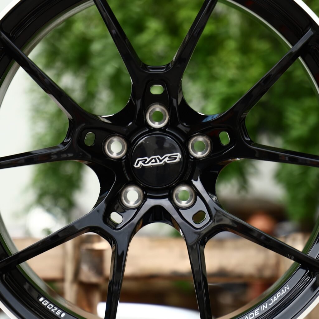 5x114.3 wheels – Gloss Black 10-Spoke Pinstripe Lip (Rays-Style), side view