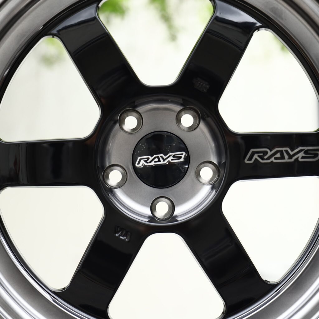 Toyota GR Supra wheels – Gloss Black 6-Spoke Gunmetal Lip (Rays-Style), lip and barrel detail