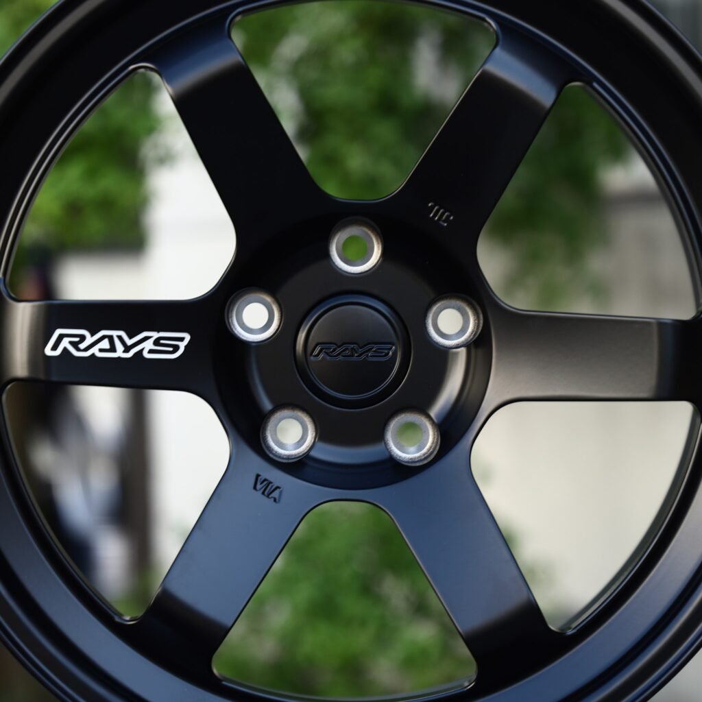 Subaru WRX wheels – Satin Black 6-Spoke (Rays-Style), lip and barrel detail