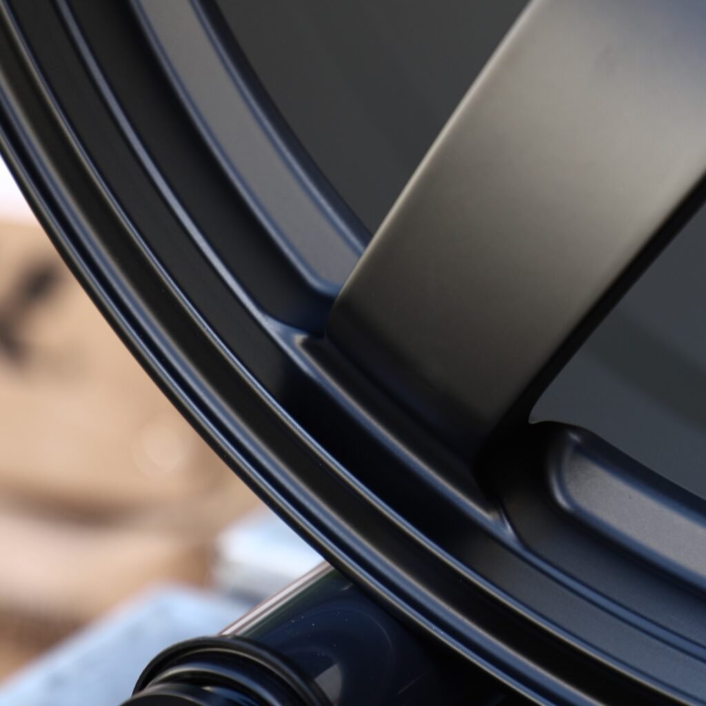 Subaru WRX wheels – Satin Black 6-Spoke (Rays-Style), lip and barrel detail