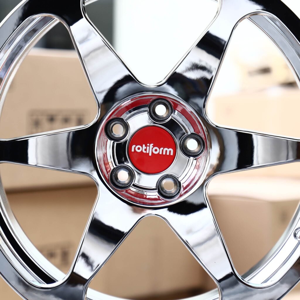 Toyota GR Supra wheels – Chrome 6-Spoke Red Cap (Rotiform-Style), lip and barrel detail