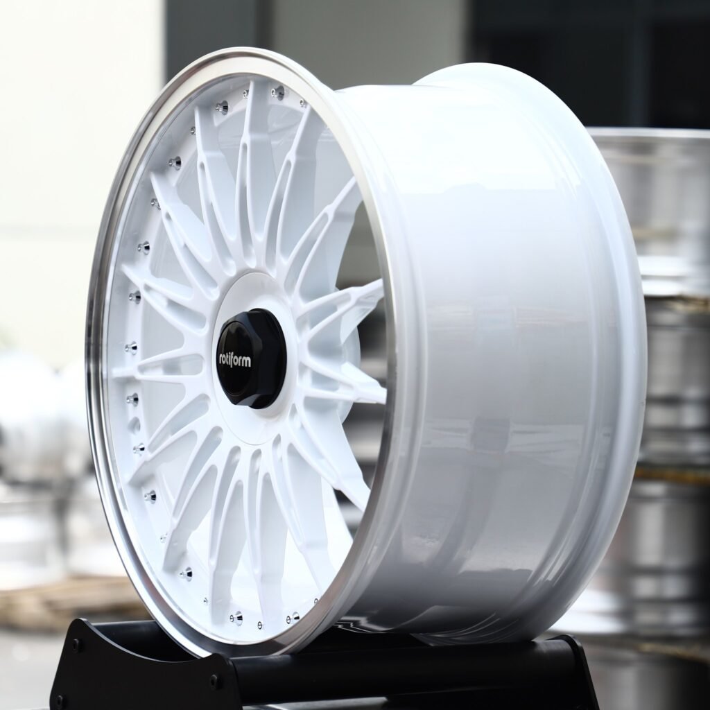 BMW X5 wheels – Gloss White Multi-Spoke Riveted Polished Lip (Rotiform-Style), angled view