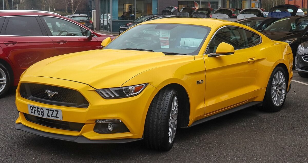 Yellow S550 Ford Mustang GT (2015-2017) with factory 19-inch wheels, the base for S550 drag wheel sizes