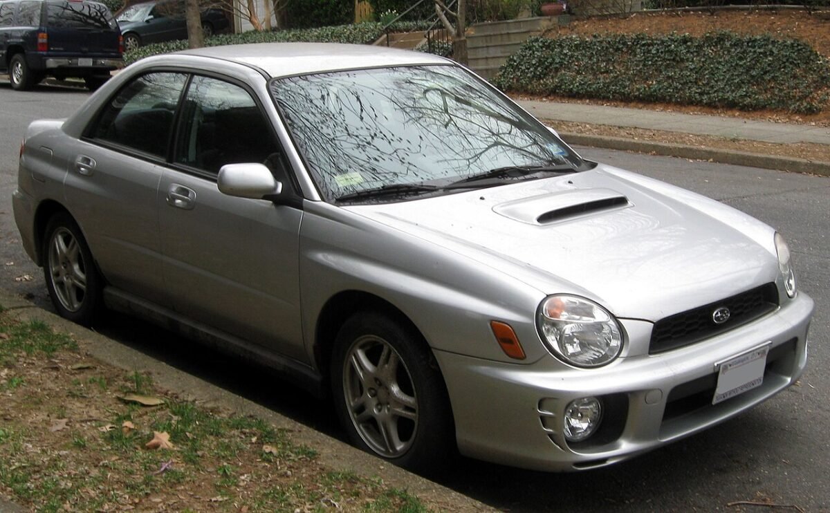 2002-2003 Subaru Impreza WRX sedan (GD) on factory 16-inch wheels, front three-quarter view