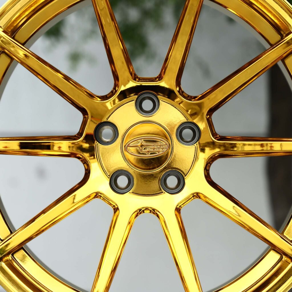5x114.3 wheels – Gold Chrome 10-Spoke (Subaru OEM-Style), side view