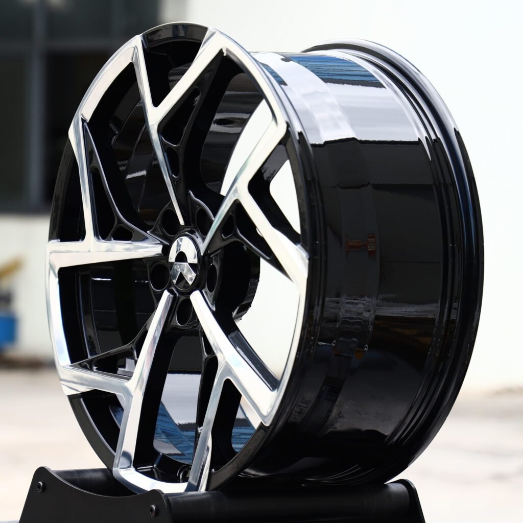 5x114.3 wheels – Gloss Black Machined 5-Blade Directional, side view