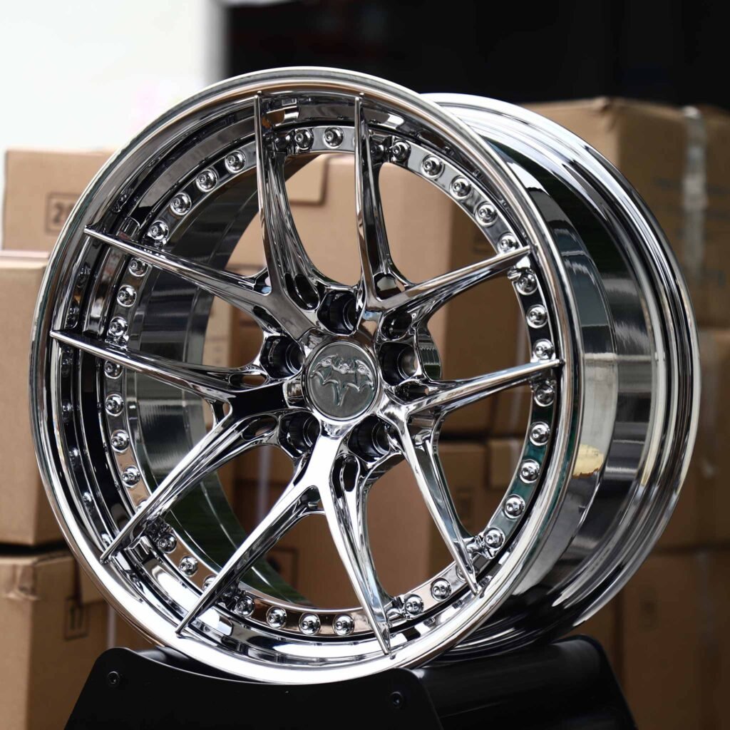 Tesla Model Y wheels – Chrome 10 Y-Spoke 2-Piece Riveted, angled view