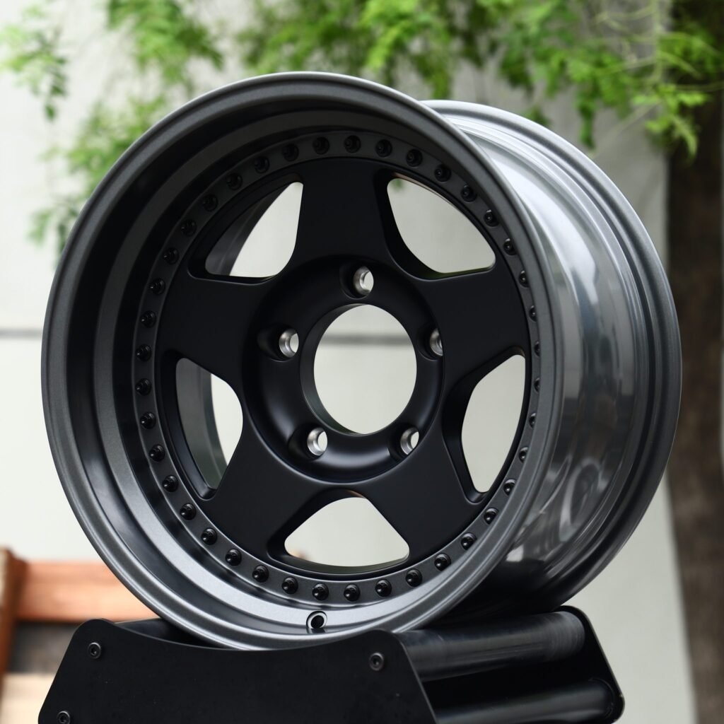 Tesla Model Y wheels – 2-Piece Satin Black 5-Spoke Riveted Gunmetal Lip, angled view