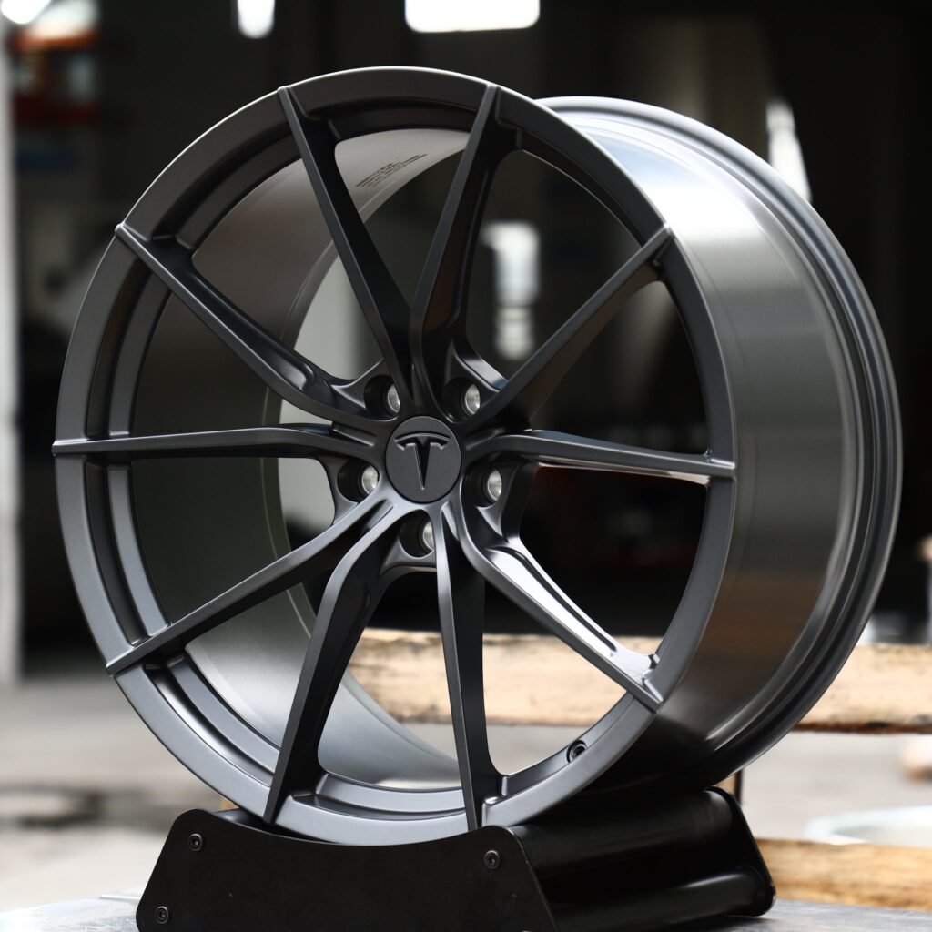 Tesla Model Y wheels – Satin Gunmetal 10-Spoke (Tesla OEM-Style), angled view