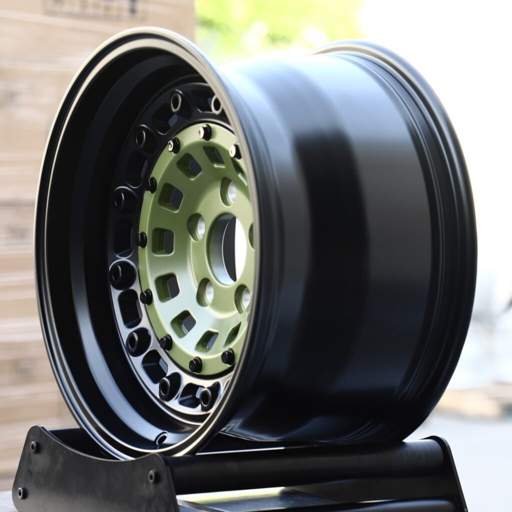 Lexus LX wheels – Olive Green Slotted Disc Black Ring, angled view