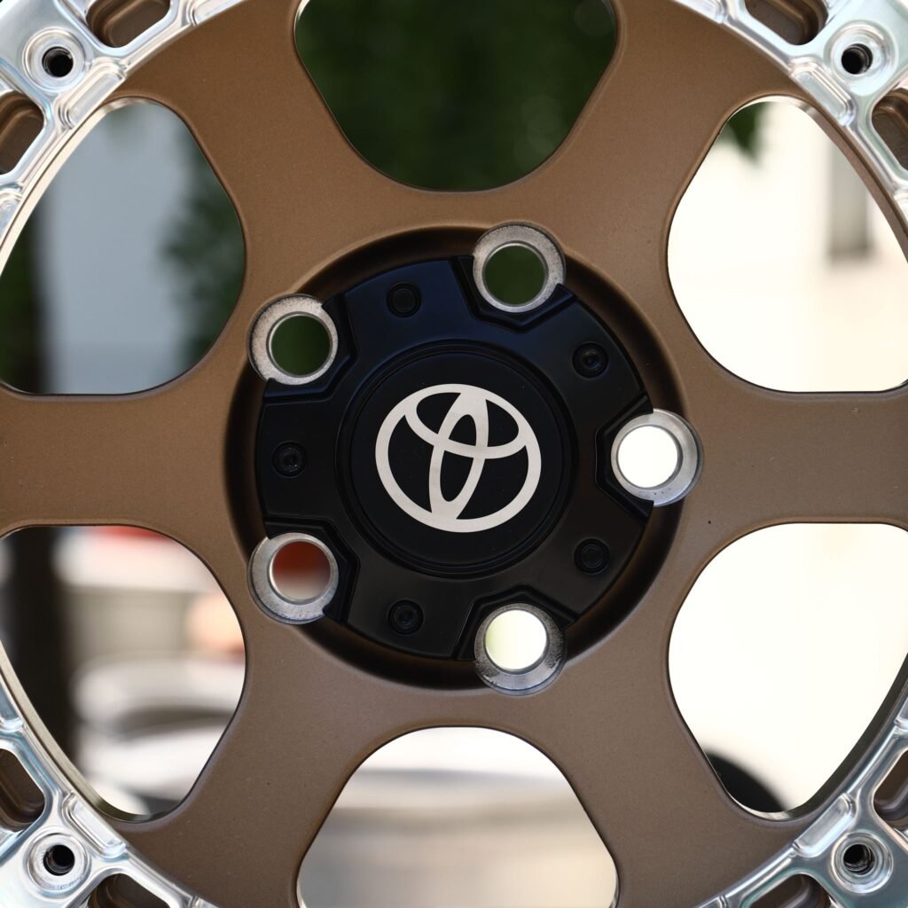 Toyota 4Runner wheels – Bronze 6-Spoke Polished Ring Beadlock (Toyota OEM-Style), lip and barrel detail