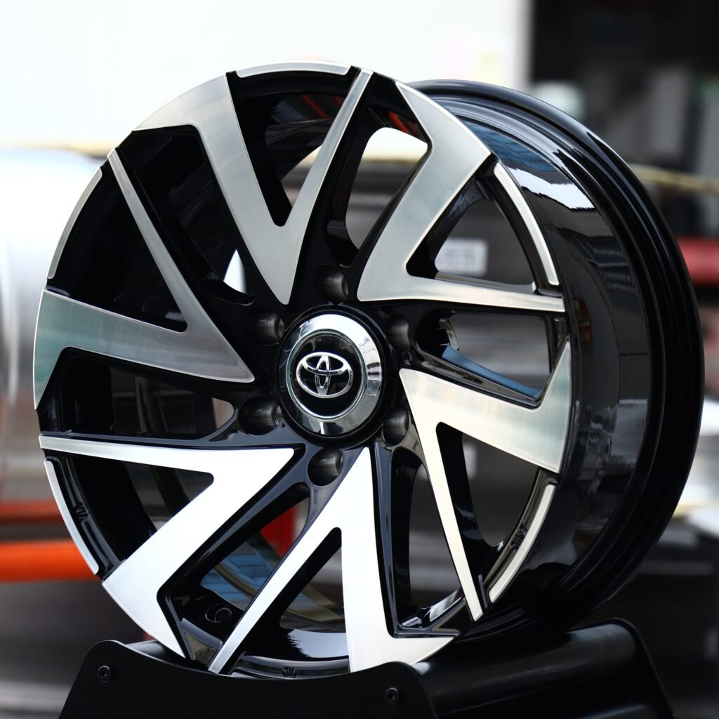 Toyota Tundra wheels – Gloss Black Machined Directional Blade (Toyota OEM-Style), angled view