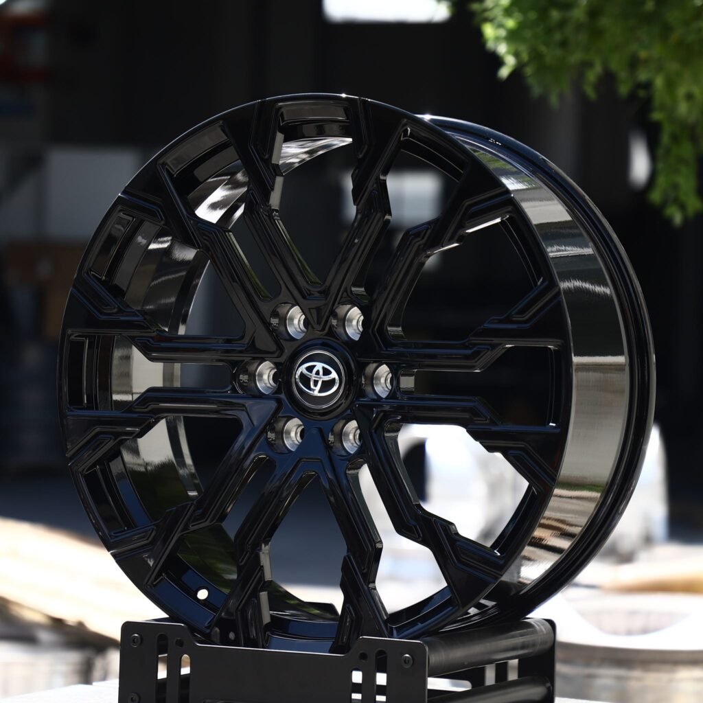 Toyota Sequoia wheels – Gloss Black Split Multi-Spoke (Toyota OEM-Style), angled view