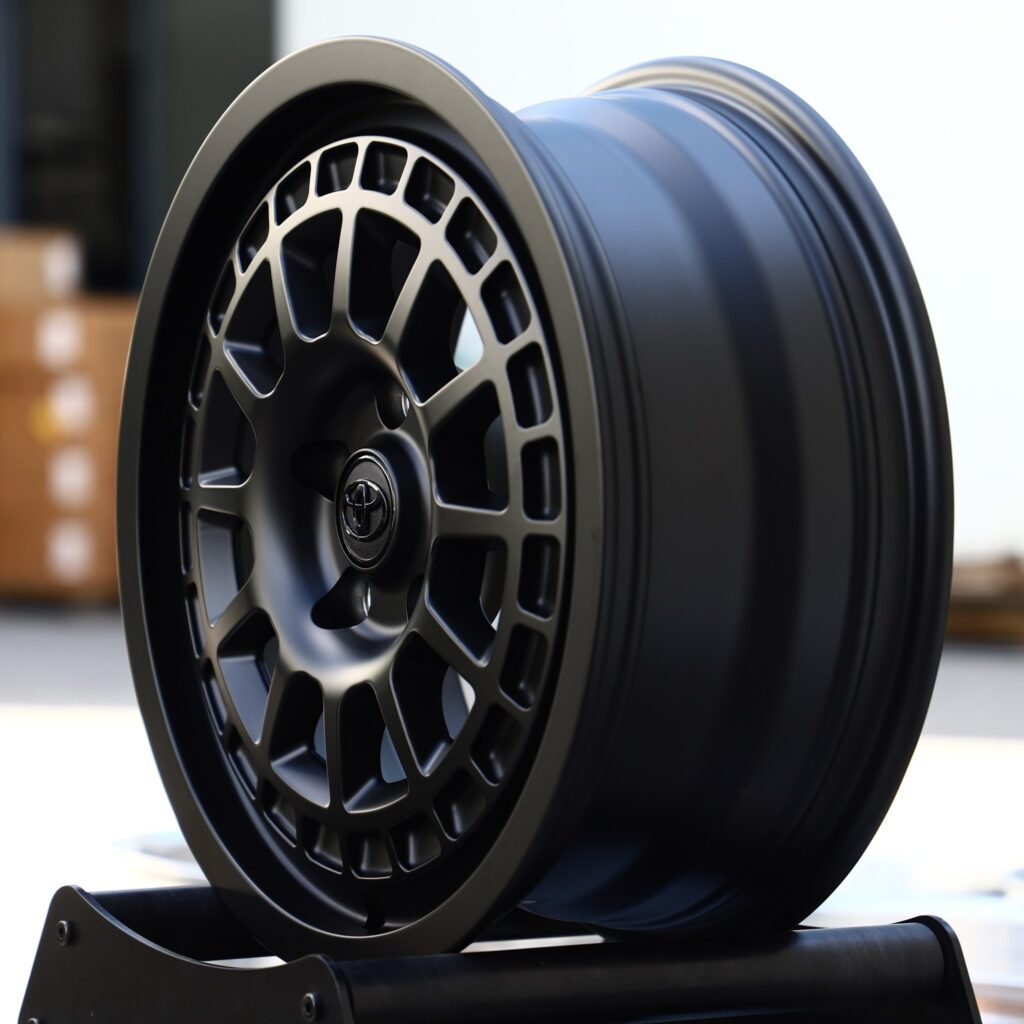 5x114.3 wheels – Matte Black 12-Spoke (Toyota OEM-Style), side view