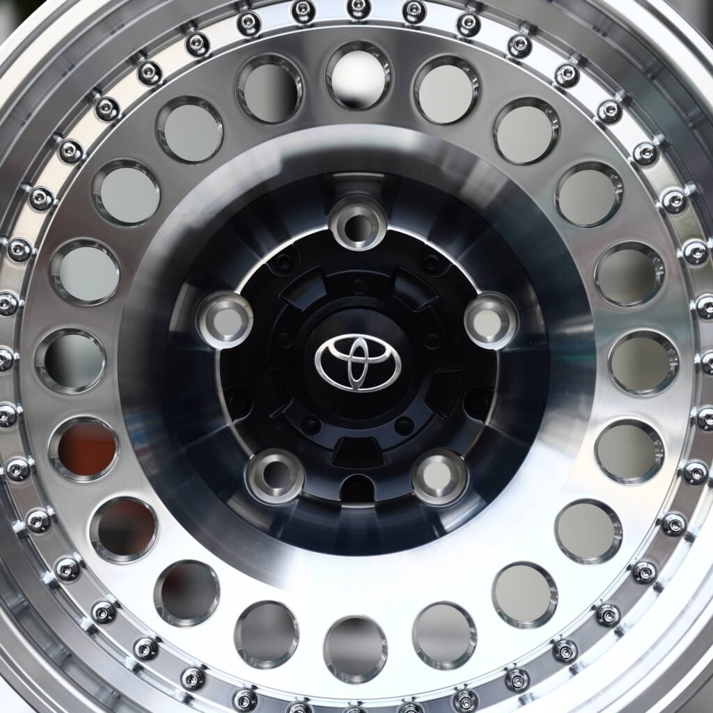 Toyota Tacoma wheels – Polished / Black Riveted Round-Hole Dish (Toyota OEM-Style), lip and barrel detail