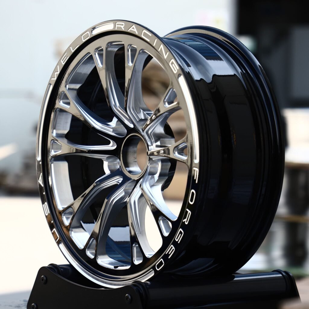 5x120.65 wheels – Black Machined 10-Spoke Lettered Lip (Weld Racing-Style), side view