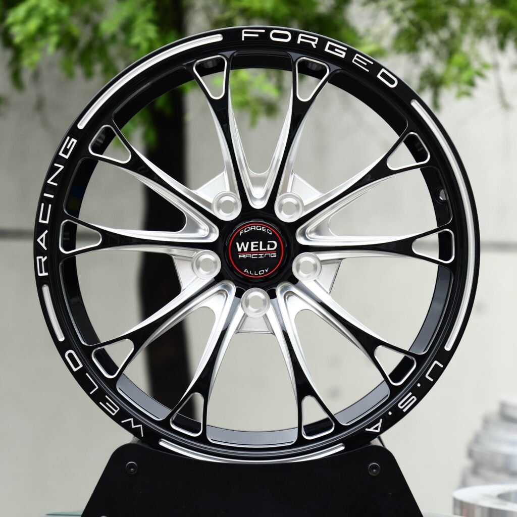 Dodge Charger wheels – Black Machined 10-Spoke Lettered Lip (Weld Racing-Style), rear view