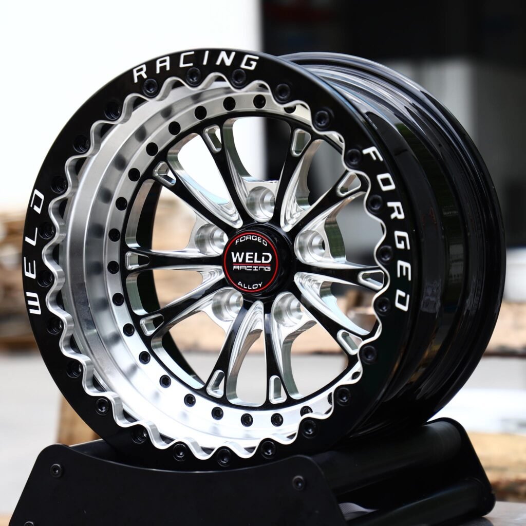 Chevrolet Camaro wheels – Black Machined Beadlock 10-Spoke Riveted Ring (Weld Racing-Style), angled view