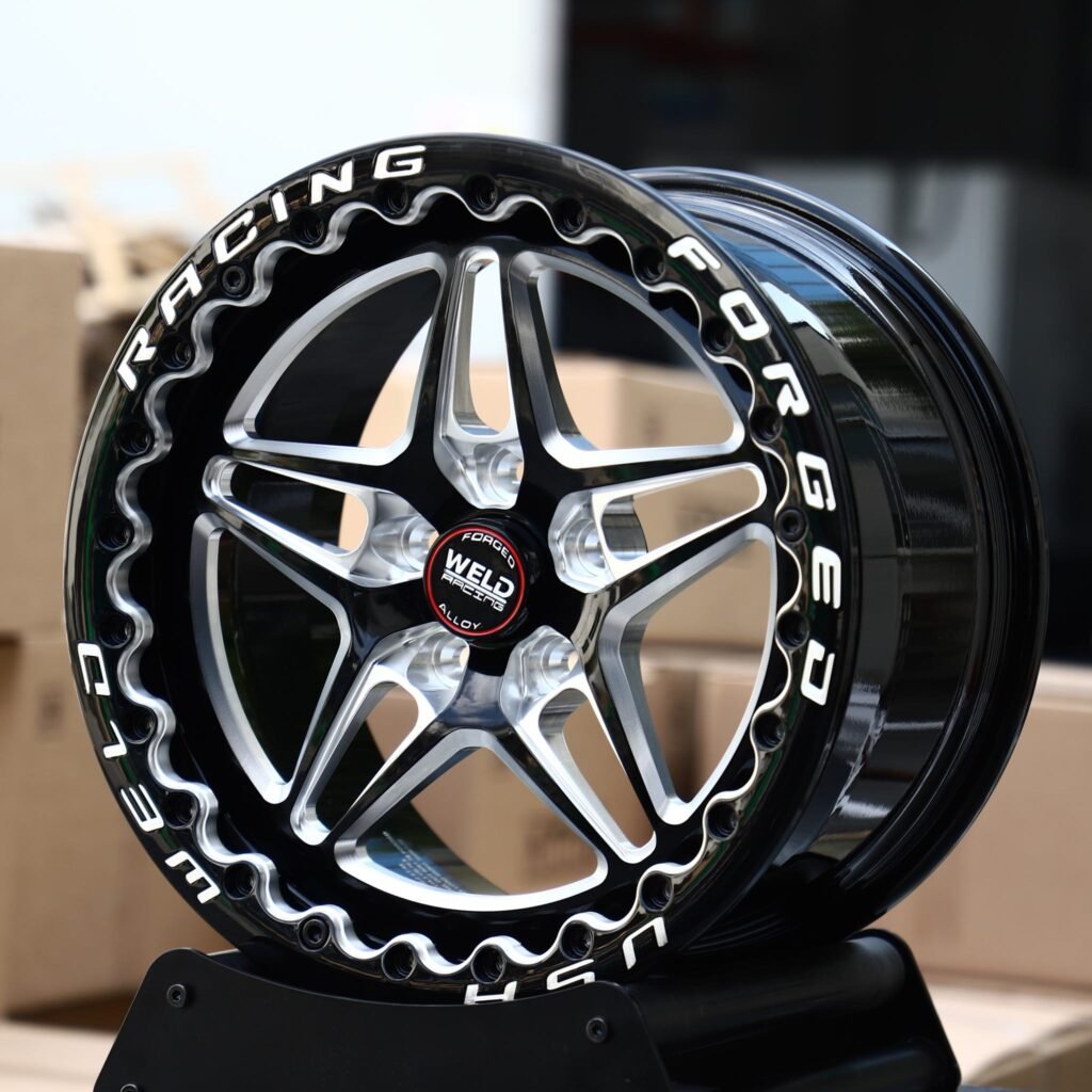 Ford Mustang wheels – Black Machined Beadlock Star 5-Spoke (Weld Racing-Style), angled view
