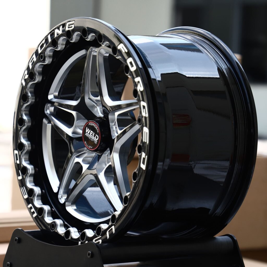5x114.3 wheels – Black Machined Beadlock Star 5-Spoke (Weld Racing-Style), side view