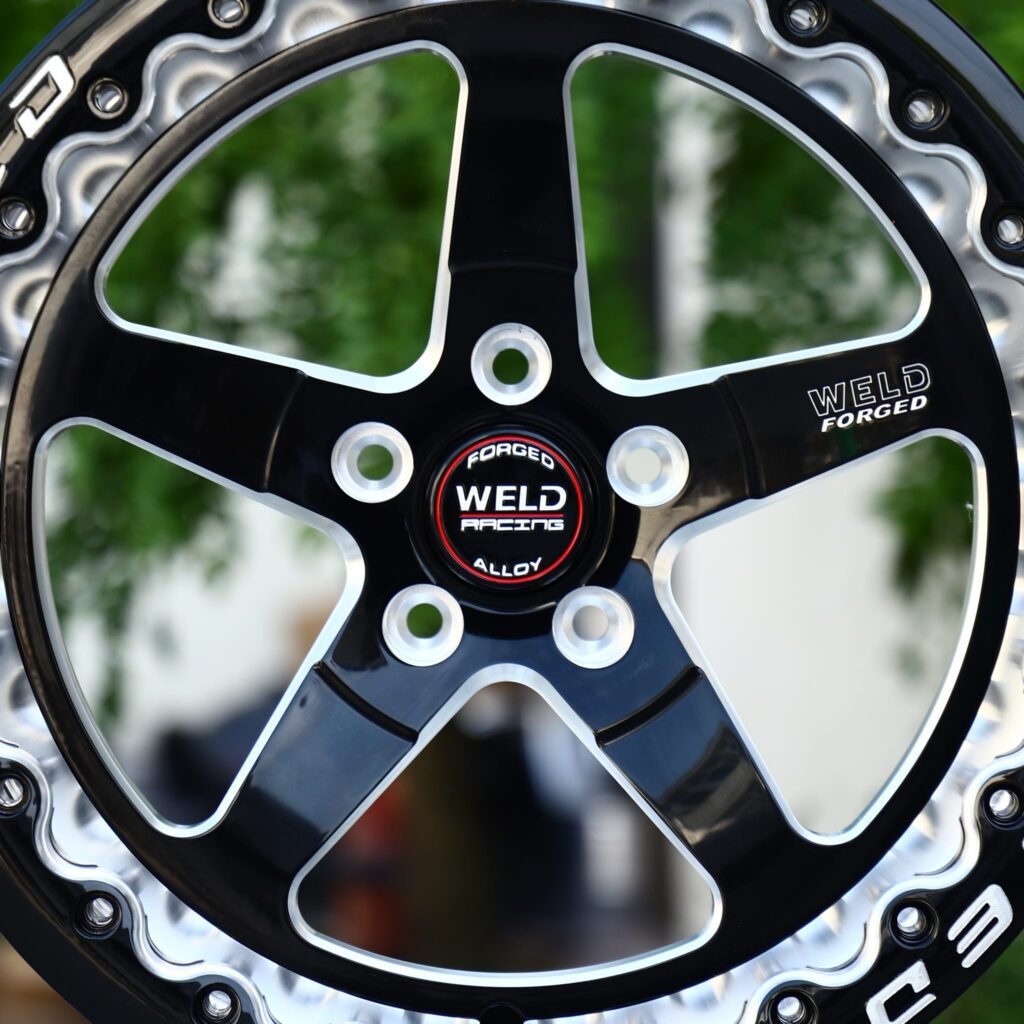 Chevrolet Camaro wheels – Black Machined Beadlock Wavy-Ring 5-Spoke (Weld Racing-Style), lip and barrel detail