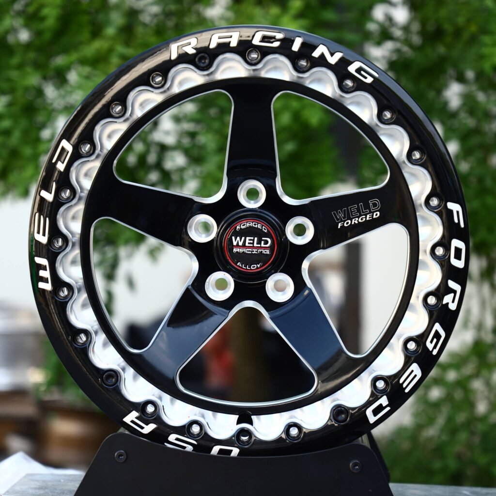 Dodge Charger wheels – Black Machined Beadlock Wavy-Ring 5-Spoke (Weld Racing-Style), rear view